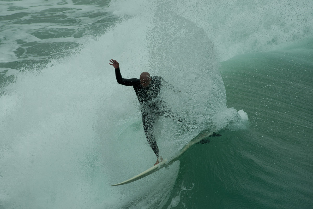 Surfer at sunrise in southern california image by Karl Duncan Photography