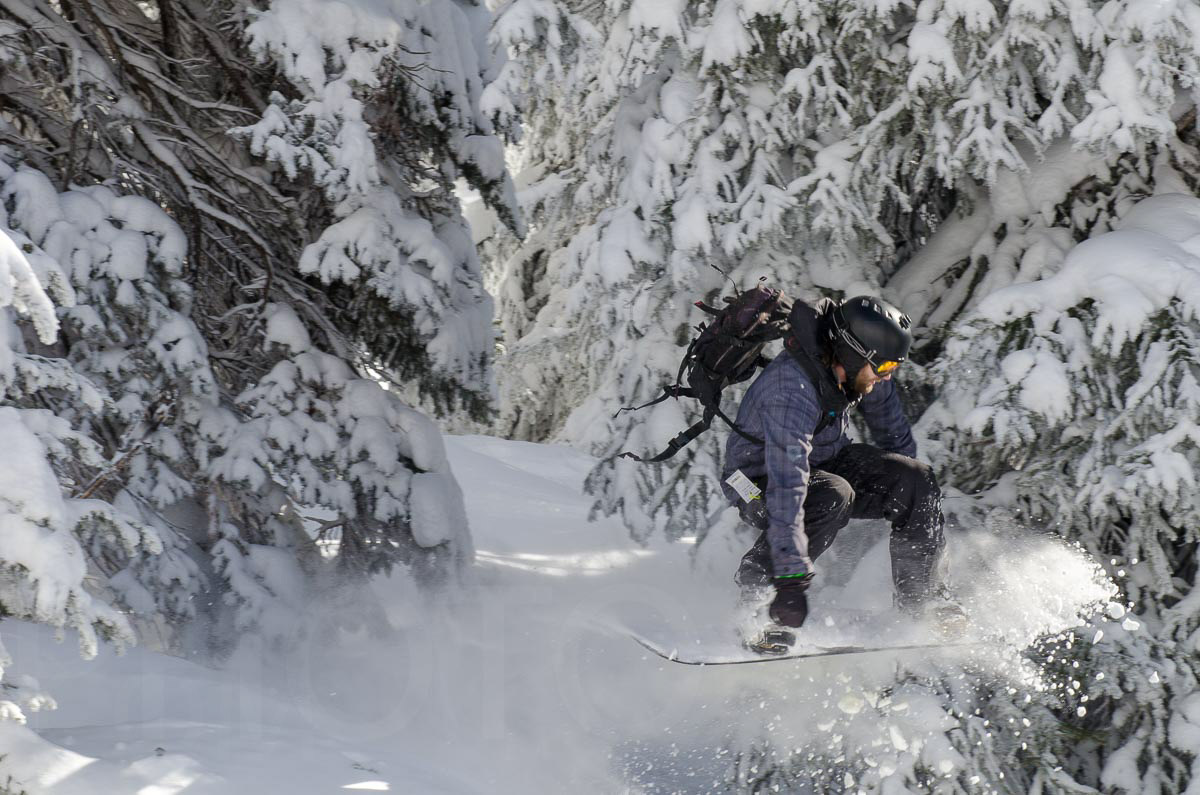 Snowboarder powder action scroller image by Karl Duncan Photography