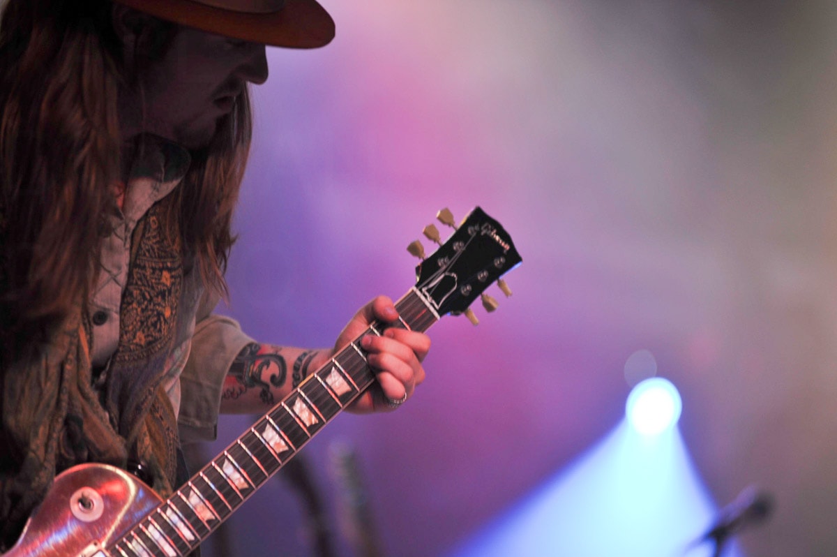 Closeup of guitarist on stage — Karl Duncan Photography