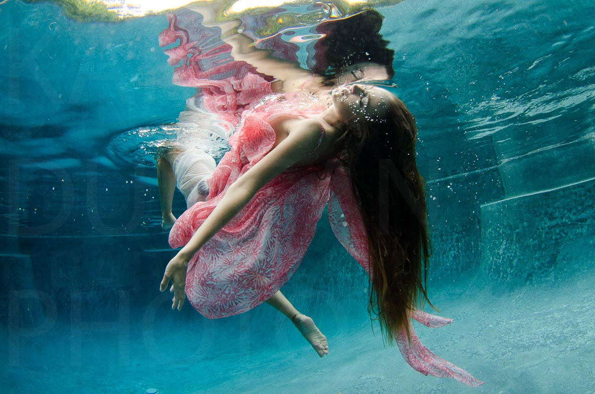 Floating girl underwater — Karl Duncan Photography