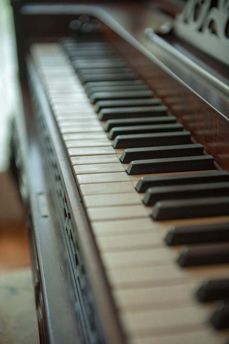 Antique piano closeup image by Karl Duncan Photography